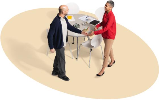 A female State Farm agent greets a gentleman in a black jacket about State Farm boat insurance.
